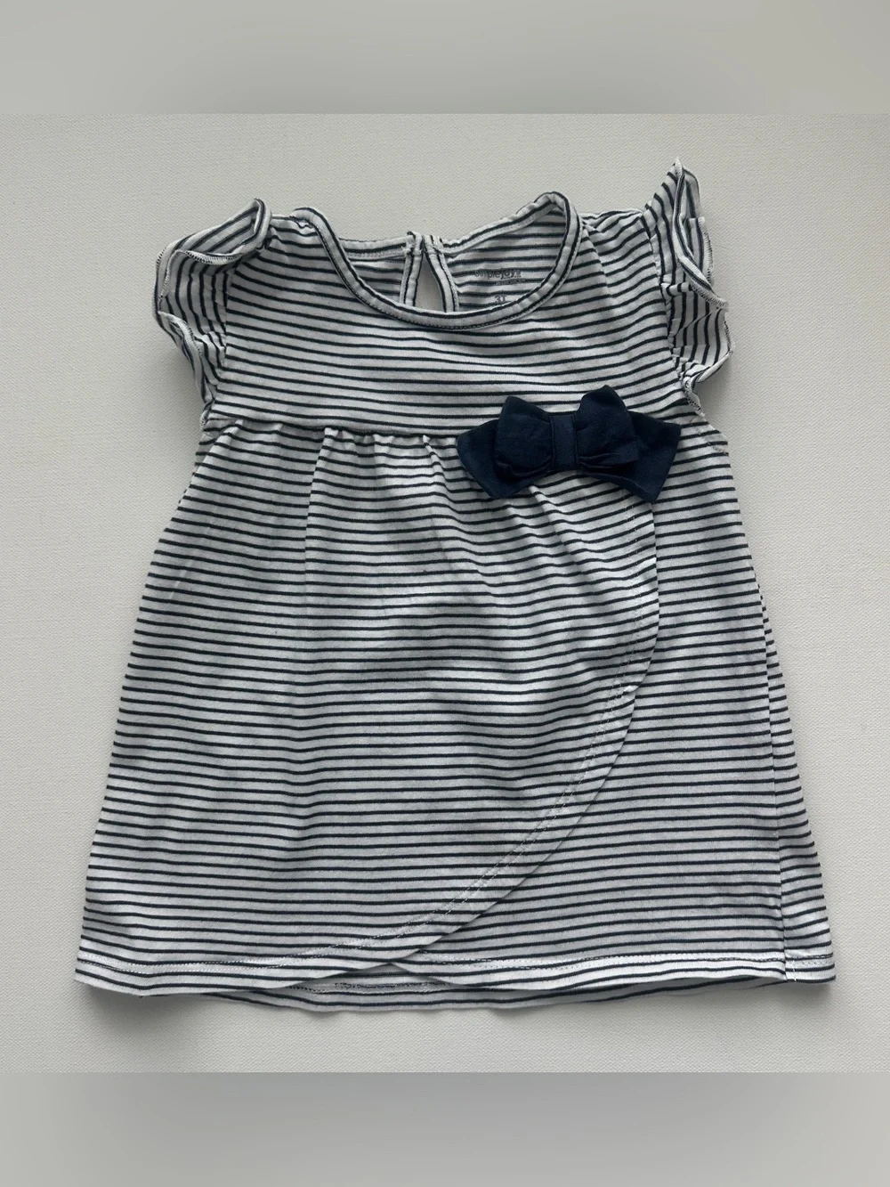 Simple Joys girl’s dress with Navy Bow Accent and Cat & Jack pants. Size 3T.